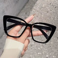 Fashionable Cat-Eye Glasses with Transparent Lenses